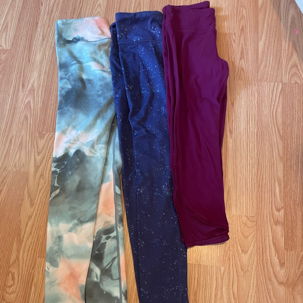 Athleta girl bundle athletic performance leggings and 1 sweatshirt. Sizes 12-16